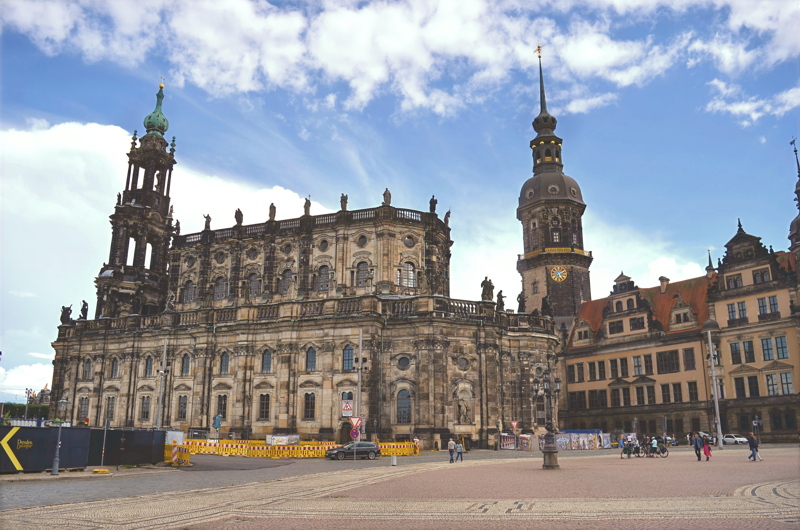 16 - The Dresden Cathedral (known in German as the Katholische Hofkirche or Cathedral of the Holy Trinity) alongside the tower of Dresden Castle located on Theaterplatz in the historic center